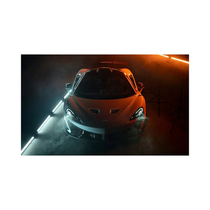 Front view of a sleek sports car in a smoke-filled studio with blue and orange LED lighting
